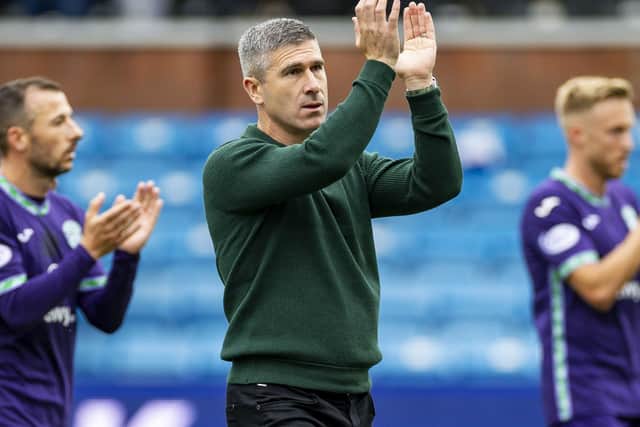 Montgomery salutes the Hibs fans after the 2-2 draw in Ayrshire.