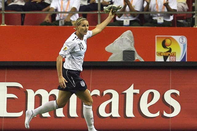 Kelly Smith celebrates scoring during the 2007 FIFA Women's World Cup (Photo credit should read MARCUS BRANDT/AFP via Getty Images)