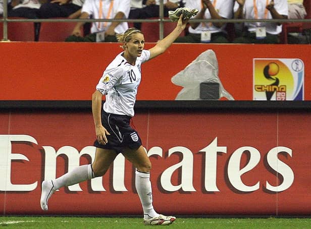 Kelly Smith celebrates scoring during the 2007 FIFA Women's World Cup (Photo credit should read MARCUS BRANDT/AFP via Getty Images)