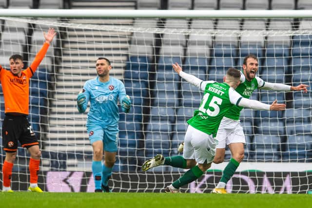 Christian Doidge celebrates his controversial goal as Hibs defeated Dundee United and secured a place in the Scottish Cup final. Photo by Ross Parker / SNS Group