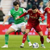 Aberdeen's Jamie McGrath tussles with Hibs' Joe Newell during the match at Easter Road.