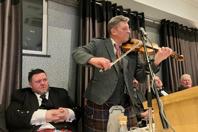 Paul Anderson and his brother David entertained the company with a fine rendition of fiddle music.
