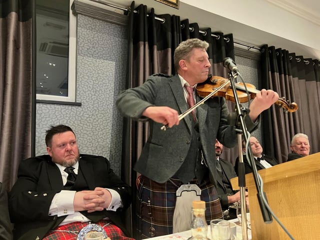 Paul Anderson and his brother David entertained the company with a fine rendition of fiddle music.
