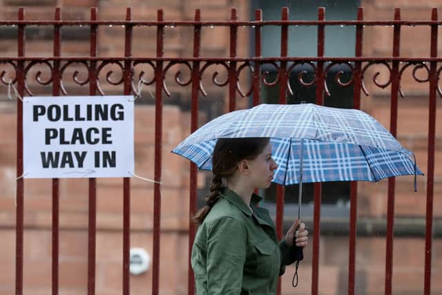 Voters arrive to cast their votes at a polling station at Notre Dame Primary School in Glasgow in the 2017 general election. Picture: PA