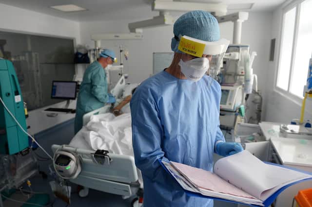 A Covid 19 patient is cared for in a negative pressure room at the Royal Alexandra Hospital, Paisley