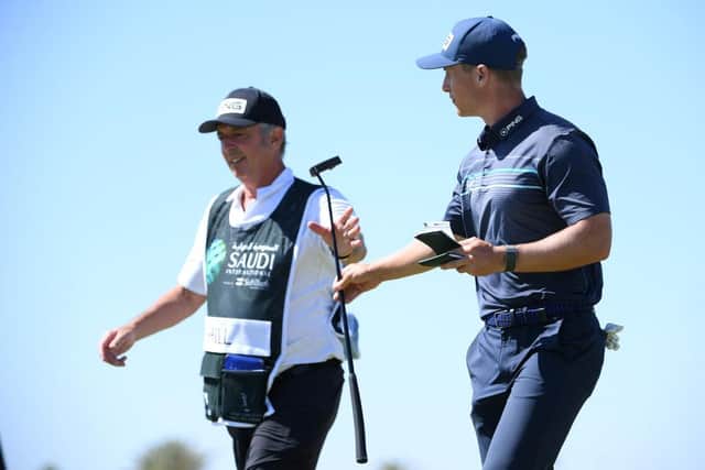 Calum Hill and his caddie Phil Morbey during the final round of the Saudi International powered by SoftBank Investment Advisers at Royal Greens Golf and Country Club in King Abdullah Economic City. Picture: Ross Kinnaird/Getty Images.