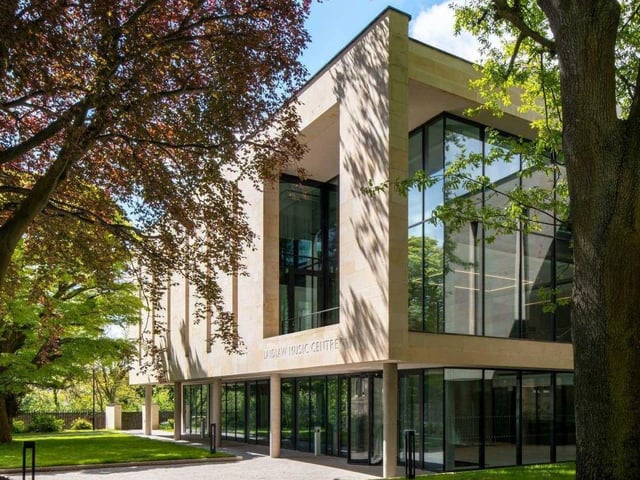 The first building dedicated to music in the University of St Andrews’ 600-year history creates new opportunities for young people – including students as well as those from the local community - to connect with the performing arts. The new building contains an intimate performing venue, flexible rehearsal space, and a high-tech recording facility, and creates a new quadrangle as an extension of the historic St Mary’s Quadrangle – the oldest part of the University dating to the 16th century. Within its pale sandstone walls, the oak lined recital room contains exceptional technology that allows it to be physically reconfigured and acoustically ‘tuned’ at the touch of a button in order to suit anything from orchestral rehearsals to small-scale ensembles.