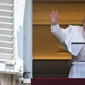 TOPSHOT - Pope Francis delivers the Sunday Angelus prayer from the window of his study overlooking St. Peter' Square at the Vatican on July 18, 2021.Photo by ANDREAS SOLARO/AFP via Getty Images