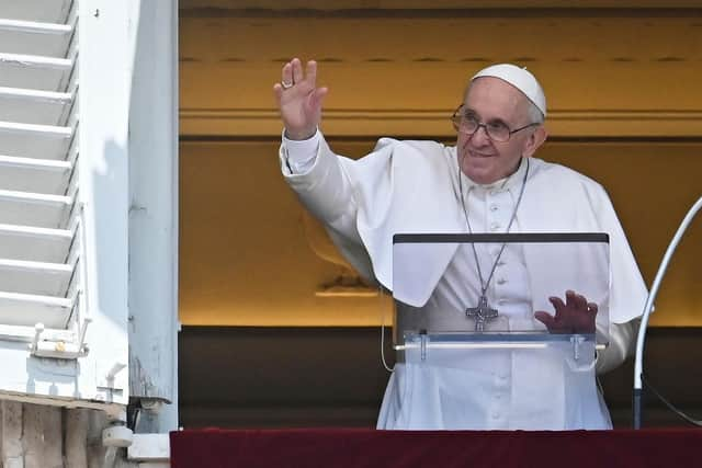 TOPSHOT - Pope Francis delivers the Sunday Angelus prayer from the window of his study overlooking St. Peter' Square at the Vatican on July 18, 2021.Photo by ANDREAS SOLARO/AFP via Getty Images