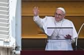 TOPSHOT - Pope Francis delivers the Sunday Angelus prayer from the window of his study overlooking St. Peter' Square at the Vatican on July 18, 2021.Photo by ANDREAS SOLARO/AFP via Getty Images