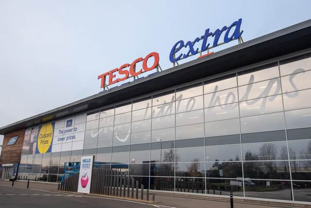 Tesco hailed its highest market share for more than a decade as it notched up a rise in festive sales.