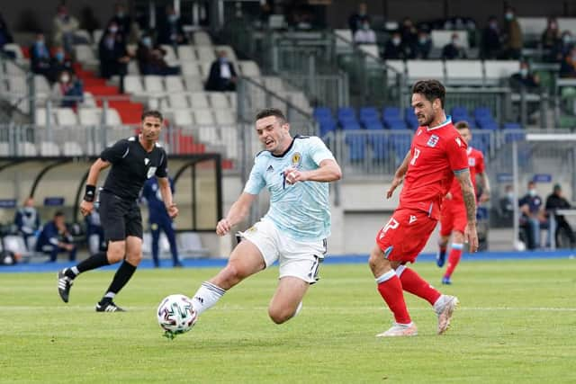 John McGinn of Scotland is challenged by Mica Pinto of Luxembourg during the international friendly match between Luxembourg and Scotland at Stade Josy Barthel on June 06, 2021 in Luxembourg, Luxembourg. (Photo by Christian Kaspar-Bartke/Getty Images)