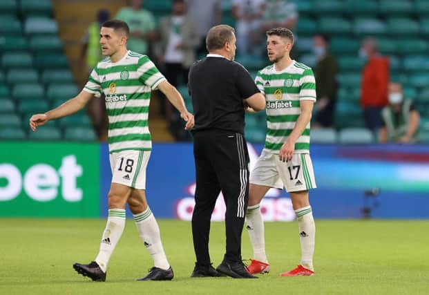 Ange Postecoglou manager of Celtic with Tom Rogic and Ryan Christie. (Photo by Steve  Welsh/Getty Images)