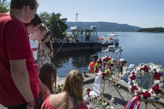 Members of Norway’s Labour Party youth wing attend a wreath-laying ceremony for the Utoya massacre victims (Picture: Aleksander andersen/AFP via Getty Images)