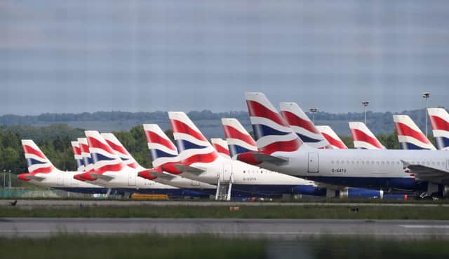 Travellers arriving in the UK will be required to self-isolate for 14 days as of Monday, but British Airways is preparing to launch legal action against the move. Picture: Gareth Fuller/PA Wire