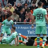 Dundee United are awarded a penalty after Steven Fletcher is fouled by Hibs defender Will Fish.  (Photo by Ross Parker / SNS Group)