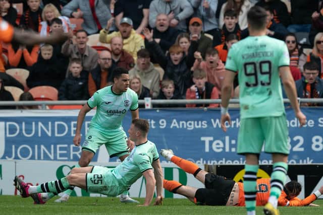 Dundee United are awarded a penalty after Steven Fletcher is fouled by Hibs defender Will Fish. (Photo by Ross Parker / SNS Group)