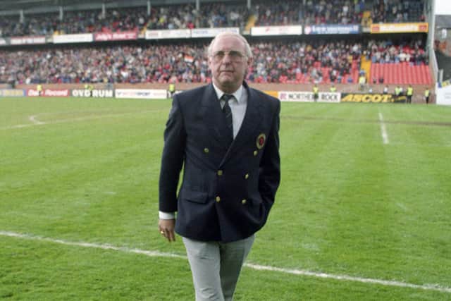 Jim McLean leaves the field to a standing ovation after his last match as Dundee Utd manager in 1993.