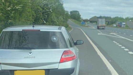 Family of four stopped northbound at J43 M6, travelling from Halifax to Cupar, Scotland to collect the family dog