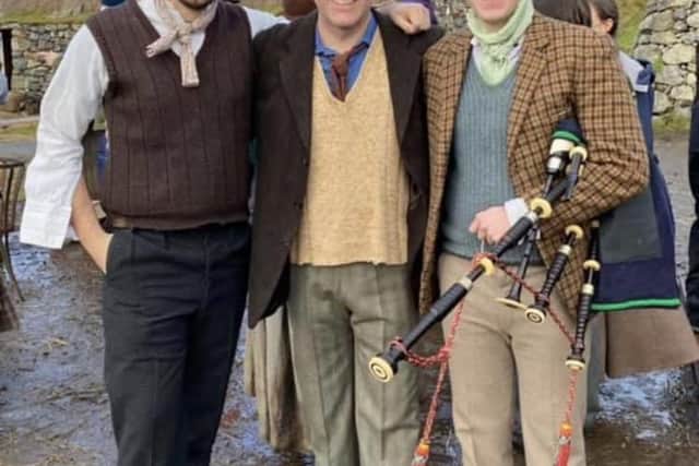 Book author John MacKay and his two sons during filming.