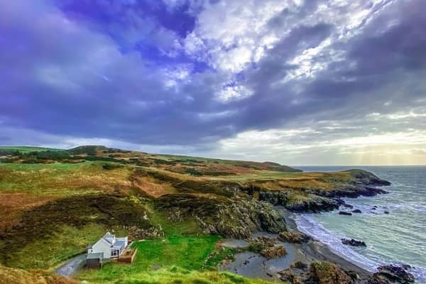 Locations don't come much better than the one occupied by Portamaggie Cottage.