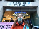 A previous event by climate change protesters demonstrating outside a branch of Barclay's bank in Glasgow