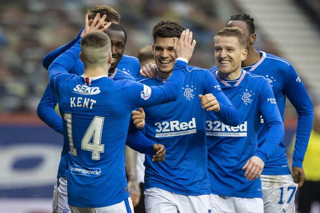 GLASGOW, SCOTLAND - MARCH 06: Ianis Hagi celebrates making it 3-0 with teammates during a Scottish Premiership match between Rangers and St Mirren at Ibrox Stadium, on March 06, 2021, in Glasgow, Scotland. (Photo by Craig Williamson / SNS Group)