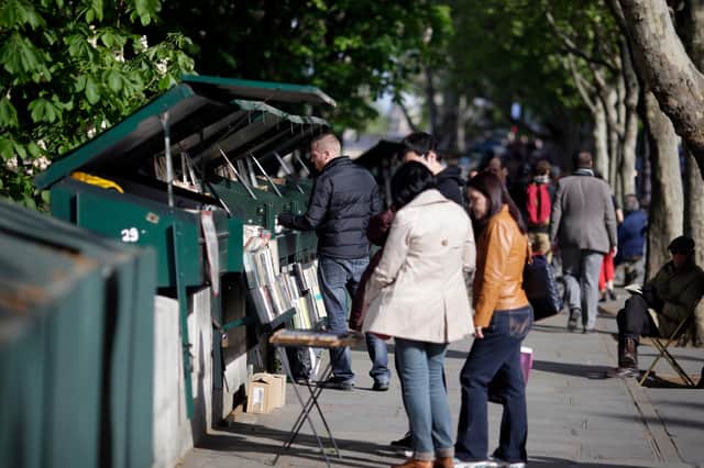 The 'Bouquinistes' of Paris are world famous. Could they inspire Edinburgh to bring back its Luckenbooths? (Picture: Kenzo Tribouillard/AFP via Getty Images)