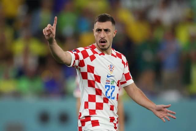 Josip Juranovic is not interested in transfer speculation while at the World Cup. (Photo by Alex Grimm/Getty Images)