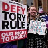 Trans rights demonstrators attend a rally in Buchanan Street, Glasgow, on 21 January (Picture: Jeff J Mitchell/Getty Images)
