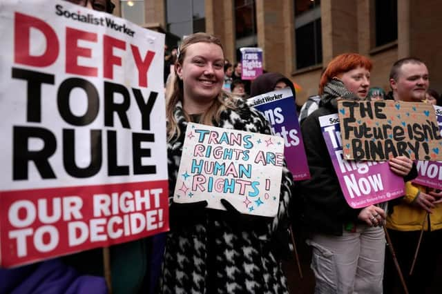 Trans rights demonstrators attend a rally in Buchanan Street, Glasgow, on 21 January (Picture: Jeff J Mitchell/Getty Images)