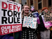 Trans rights demonstrators attend a rally in Buchanan Street, Glasgow, on 21 January (Picture: Jeff J Mitchell/Getty Images)