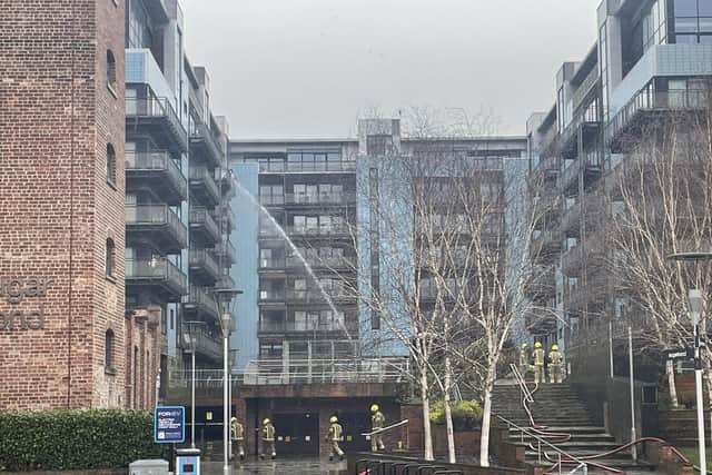 Firefighters continue to douse the flats that were ablaze in Edinburgh. Picture: Ilona Amos