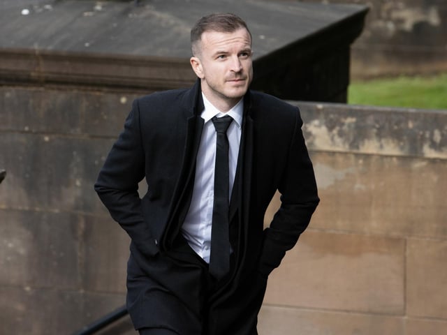 Former Rangers player and current Hearts midfielder Andy Halliday at the funeral of Rangers kitman Jimmy Bell