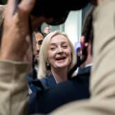Former prime minister Liz Truss leaves the Great British Growth Rally, a fringe event where she spoke alongside Dame Priti Patel, Sir Jacob Rees-Mogg and Ranil Jayawardena. Wire