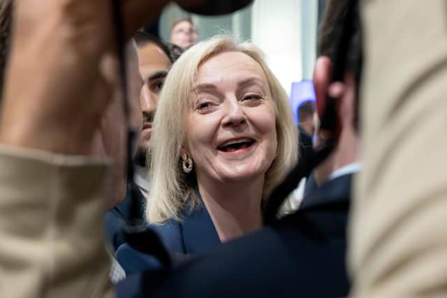 Former prime minister Liz Truss leaves the Great British Growth Rally, a fringe event where she spoke alongside Dame Priti Patel, Sir Jacob Rees-Mogg and Ranil Jayawardena. Wire