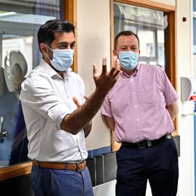 Scottish Clinical Director Jason Leitch with then Health Secretary Humza Yousaf during the pandemic in 2021 (Picture: Jeff J Mitchell/ POOL /AFP)