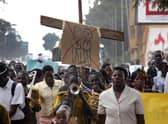 Anti-Homosexual activists march on the streets of Kampala. Picture: ISAAC KASAMANI/AFP via Getty