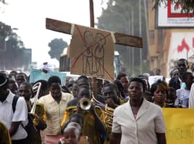 Anti-Homosexual activists march on the streets of Kampala. Picture: ISAAC KASAMANI/AFP via Getty