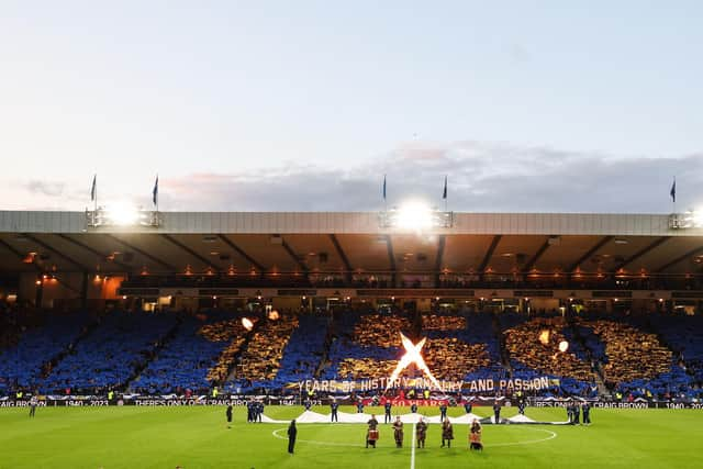 Scotland fans display a tifo reading '150 Years of History, Rivalry and Passion' ahead of the match against England.