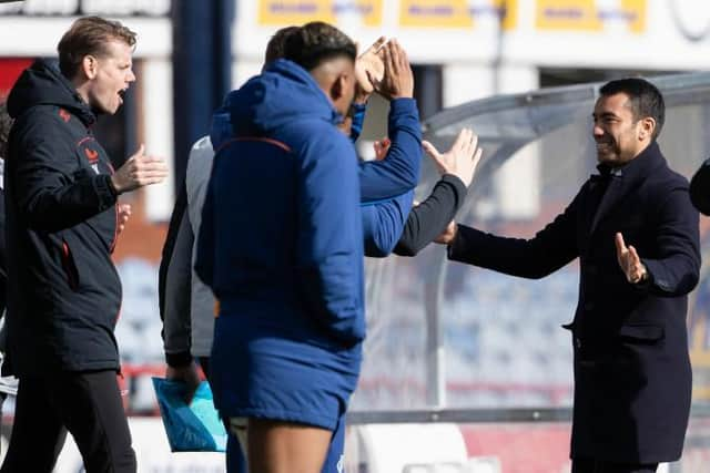 Rangers manager Giovanni van Bronckhorst celebrates at the full-time whistle after his team's 2-1 win over Dundee at Dens Park. (Photo by Alan Harvey / SNS Group)