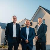 Pictured outside a Cala home are Ross Maclennan, land director, Steve Jarvie, construction director, and Fraser Carr, regional director.