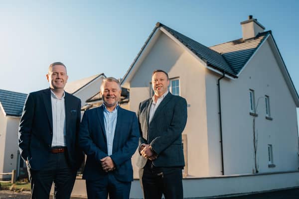 Pictured outside a Cala home are Ross Maclennan, land director, Steve Jarvie, construction director, and Fraser Carr, regional director.