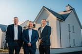 Pictured outside a Cala home are Ross Maclennan, land director, Steve Jarvie, construction director, and Fraser Carr, regional director.