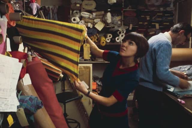 Mary Quant selecting fabric, 1967 PIC: Courtesy of V&A Dundee