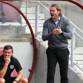Hearts manager Robbie Neilson with coaches Lee McCulloch (centre) and Gordon Forrest against Livingston.