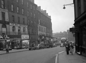 Looking down Leith Street in Edinburgh towards Picardy Place in 1958. Picture shows (left hand side) the Top Deck restaurant, John Collier menswear and Timpson's shoe shop. All these shops were demolished to make way for St James Centre and King James Hotel in 1969.