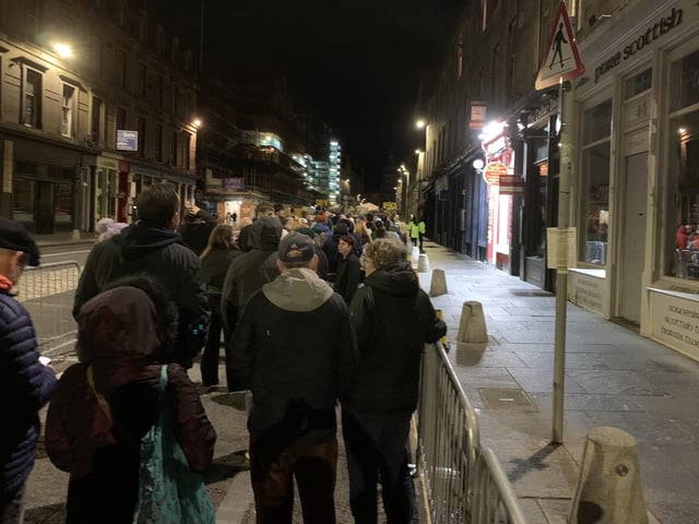 People waited into the night in Edinburgh to pay their respects to the Queen as she lies in state at St Giles' Cathedral. Picture date: Tuesday September 13, 2022.