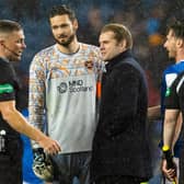 Hearts manager Robbie Neilson confronts referee John Beaton at full time after the 1-0 defeat to Rangers at Ibrox. (Photo by Alan Harvey / SNS Group)