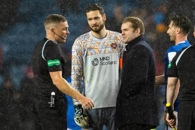 Hearts manager Robbie Neilson confronts referee John Beaton at full time after the 1-0 defeat to Rangers at Ibrox. (Photo by Alan Harvey / SNS Group)